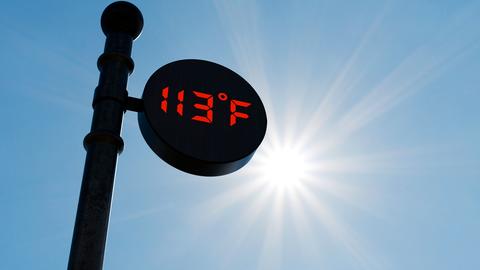 Thermometer showing 113 degree temp outside