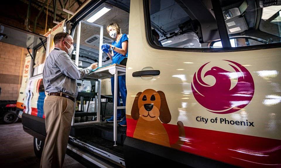 Phoenix City Manager being tested by nose swap at the COVID-19 testing van
