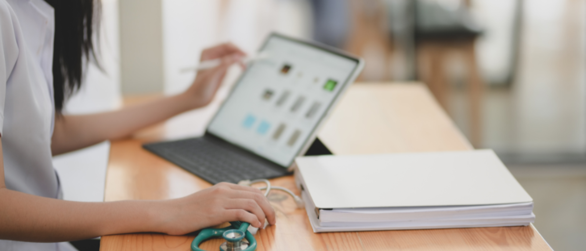 Female doctor using tablet apps