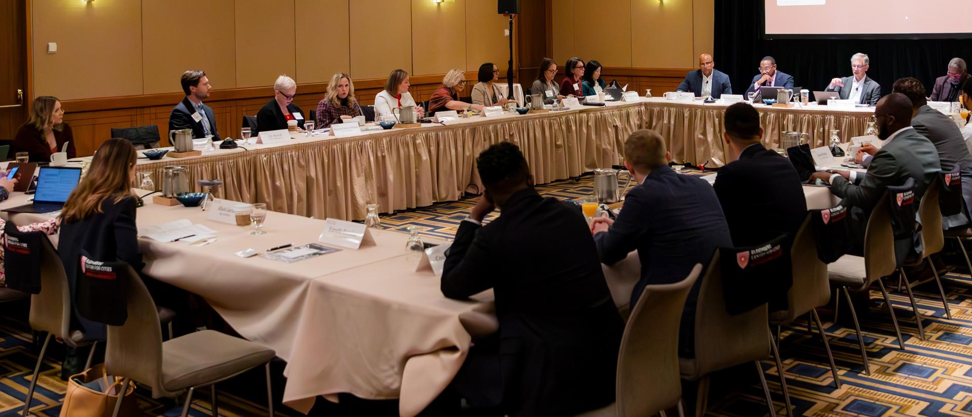Group of people at a large conference table