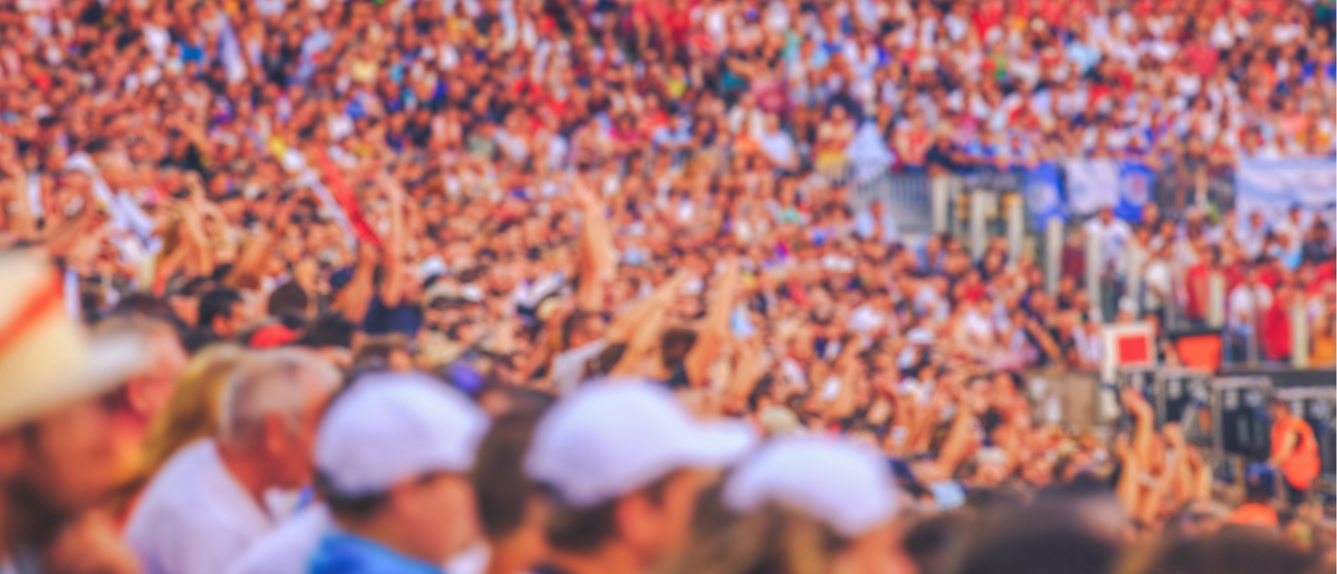 Crowd in stadium on a hot day
