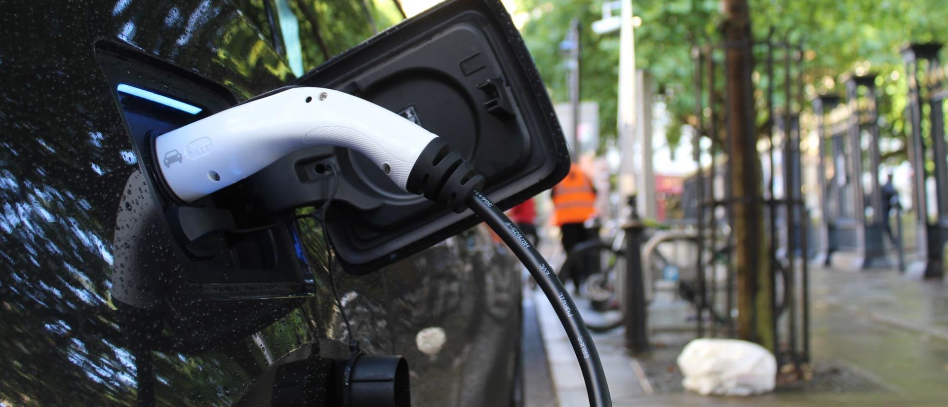 EV charger plugged into a car