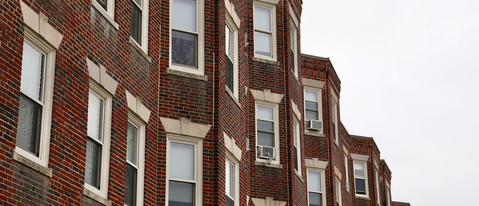 A row of brick town house apartments 