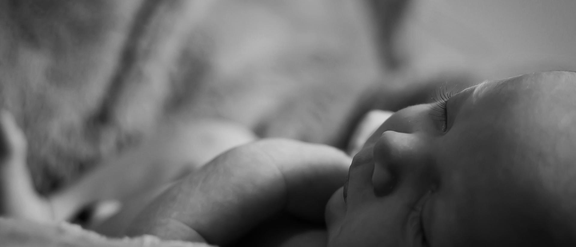 Greyscale picture of an infant sleeping