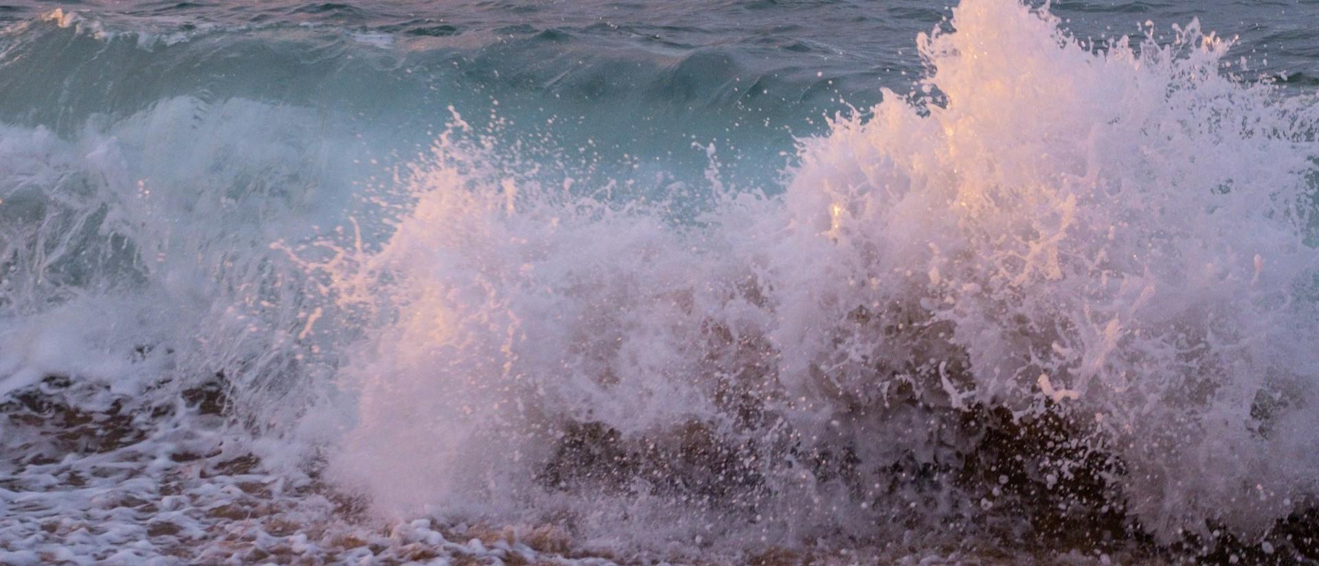 Waves crashing on beach