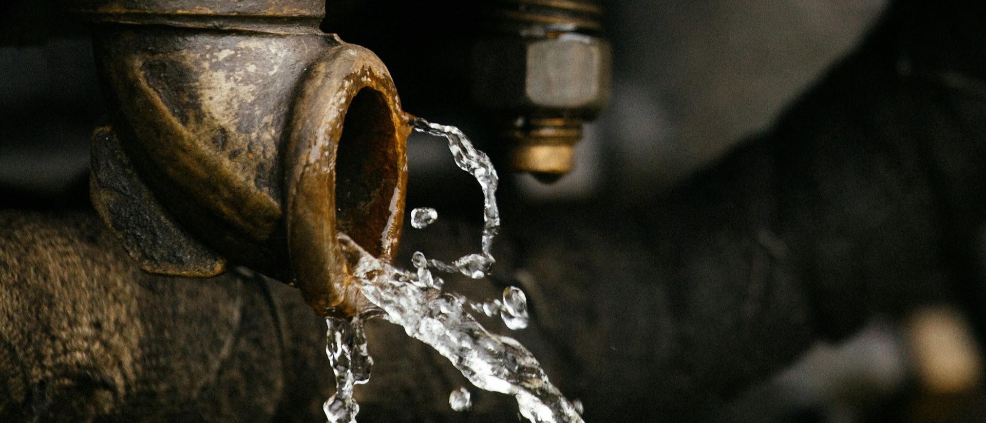 Water coming out of an industrial pipe