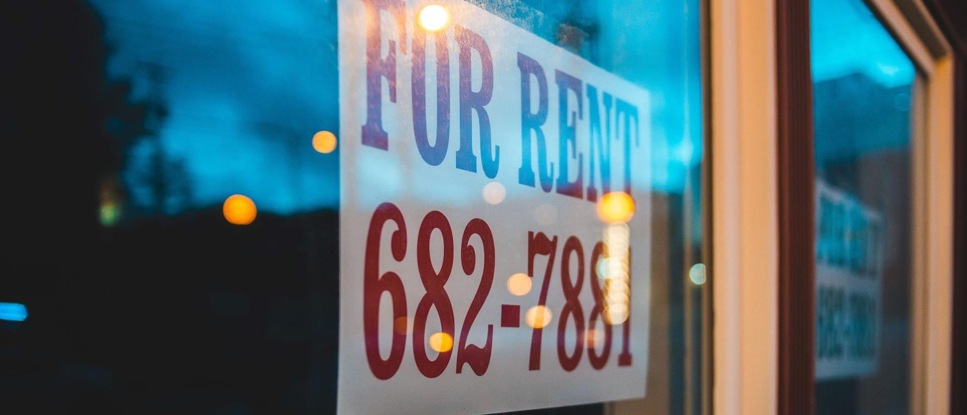 For Rent sign in a window