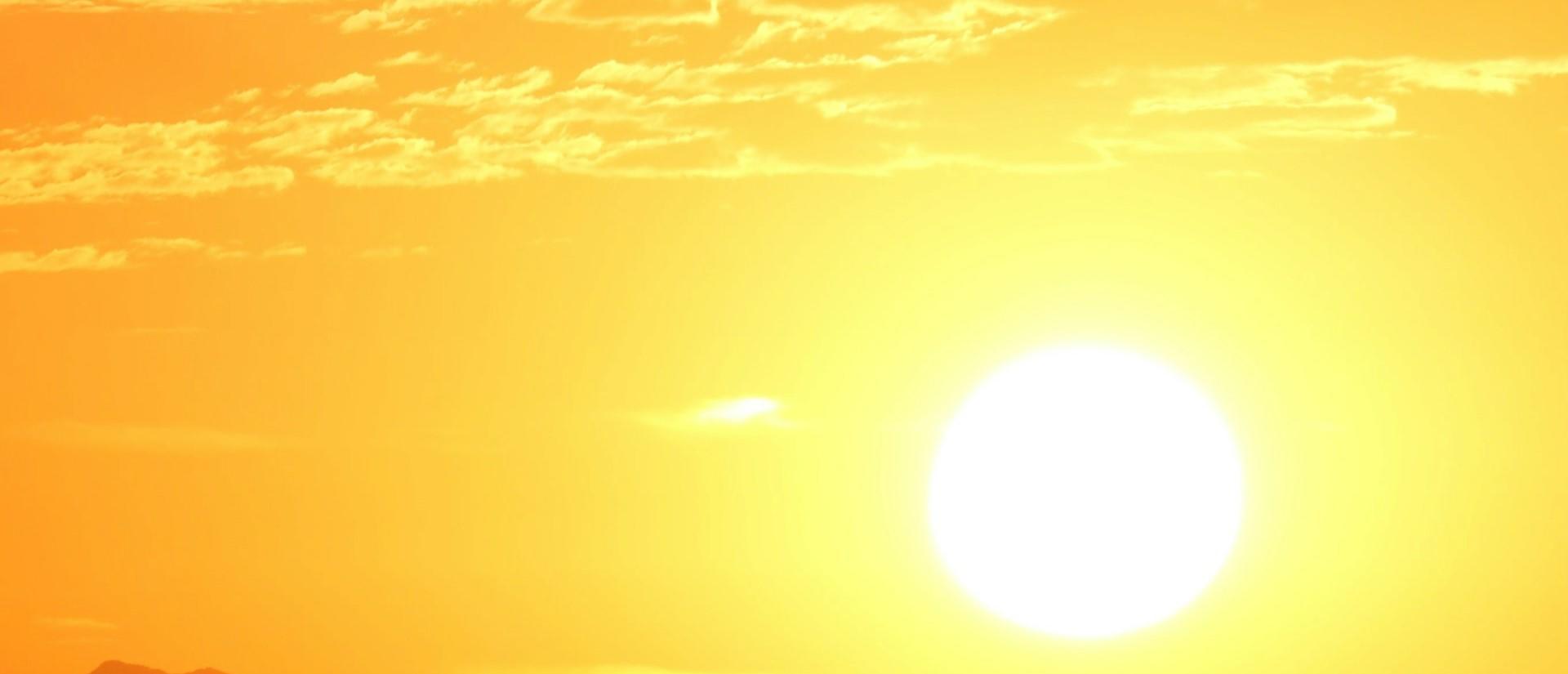Very bright hot yellow sun