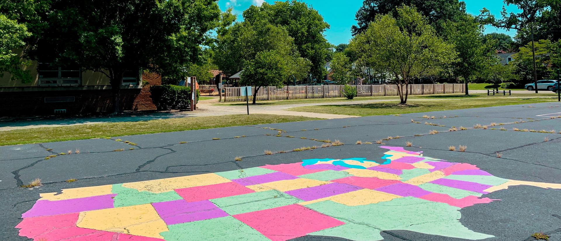 Map of US painted on blacktop in playground