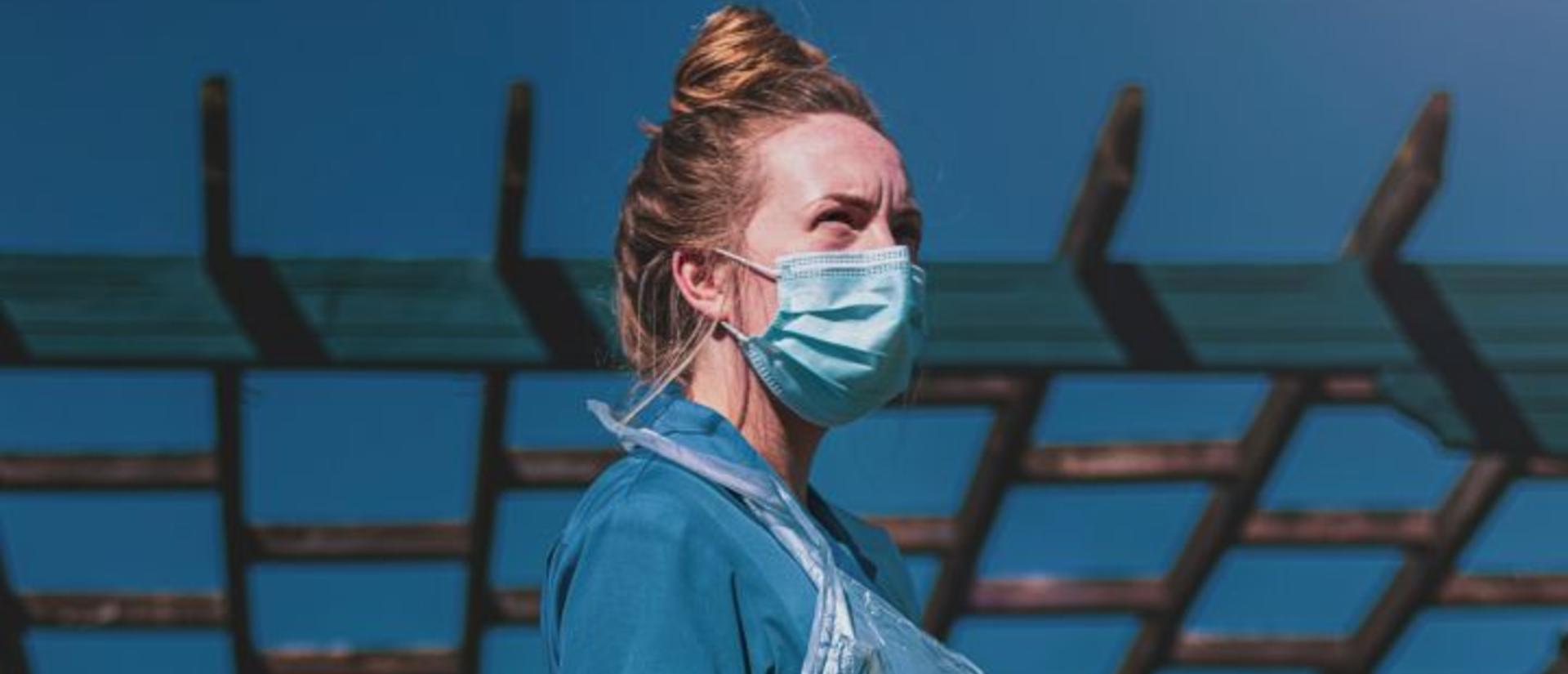 Woman wearing a face mask covering