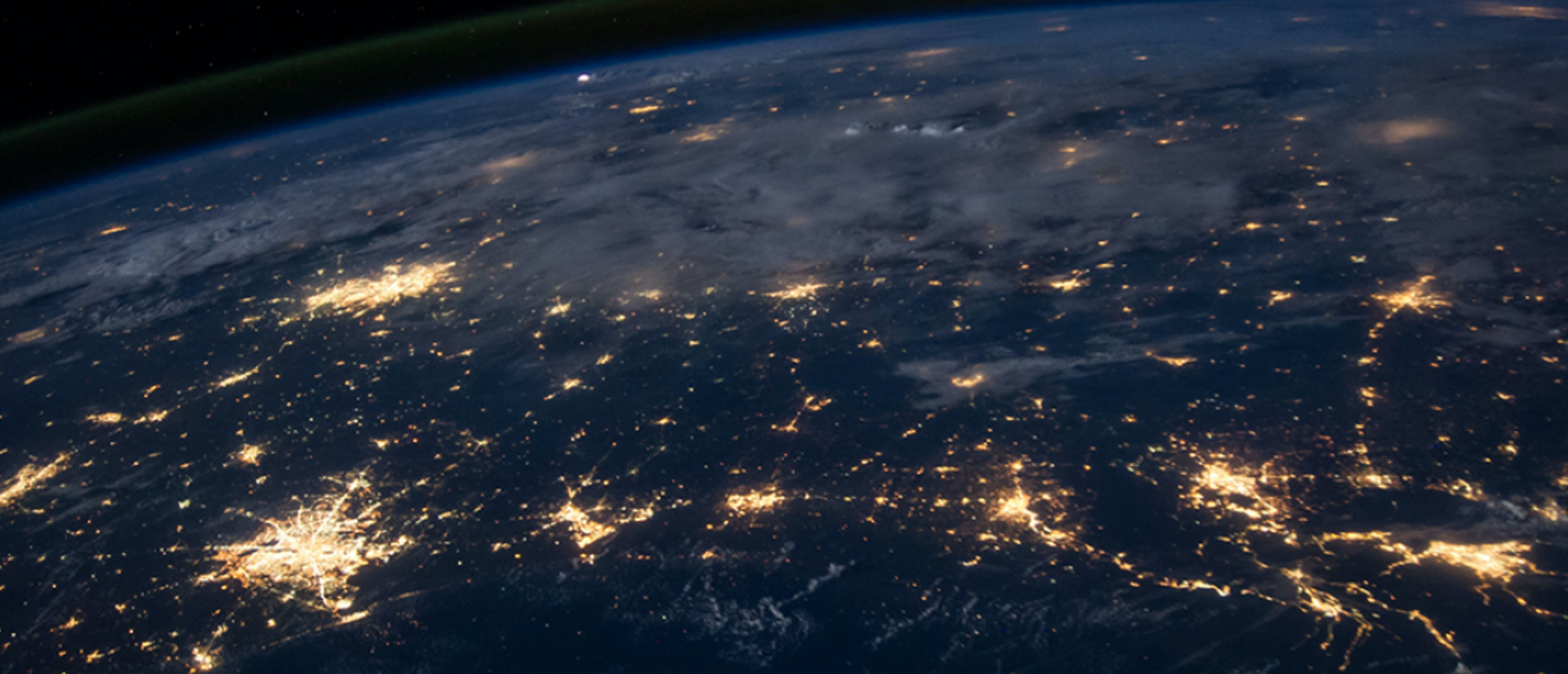 The earth from space with network of lights lit up